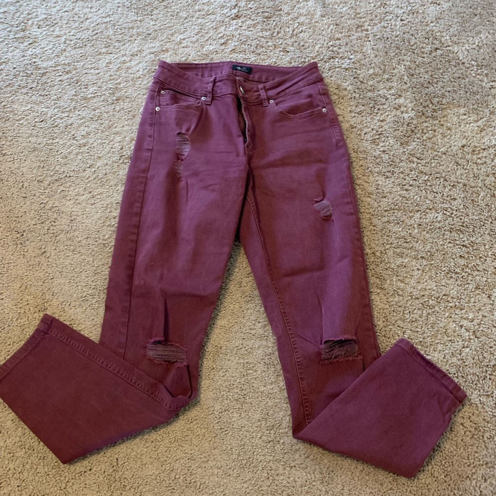 Burgundy ripped jeans